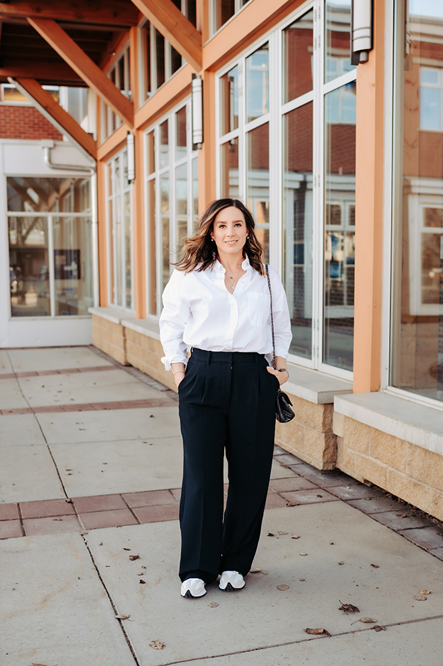 Model in Black Pants and Orange Sneakers · Free Stock Photo